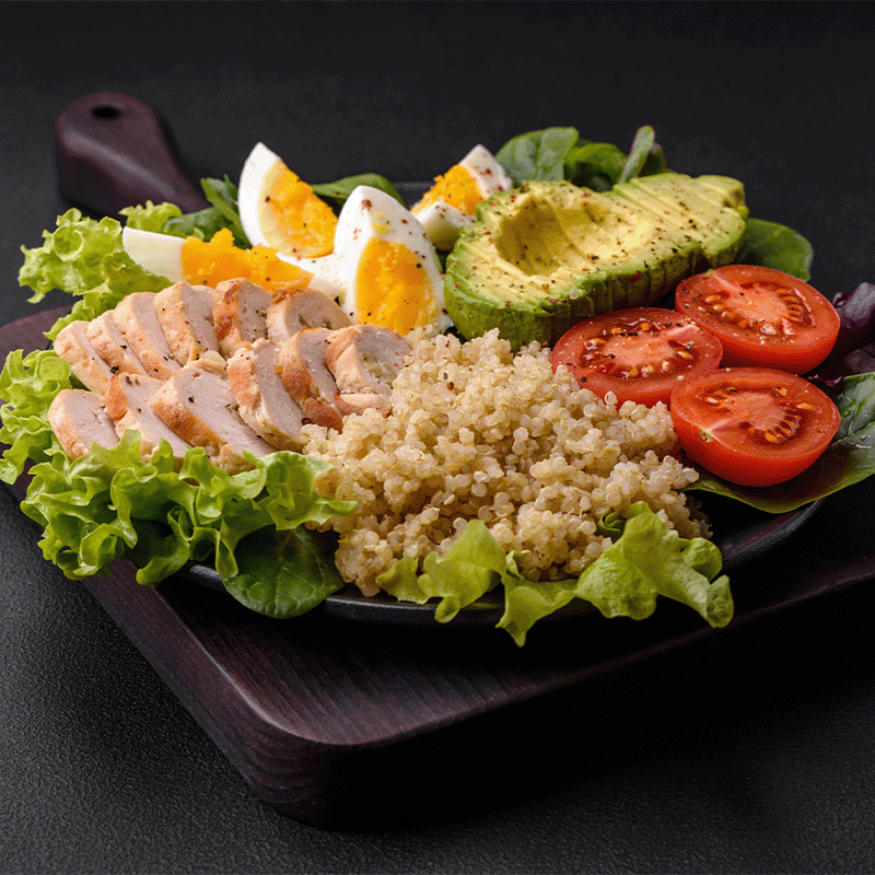 healthy meal chicken hard cooked eggs avocado tomato